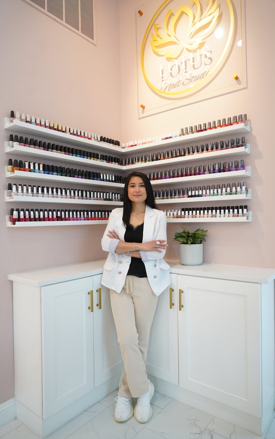 A Lotus Nail Studio technician